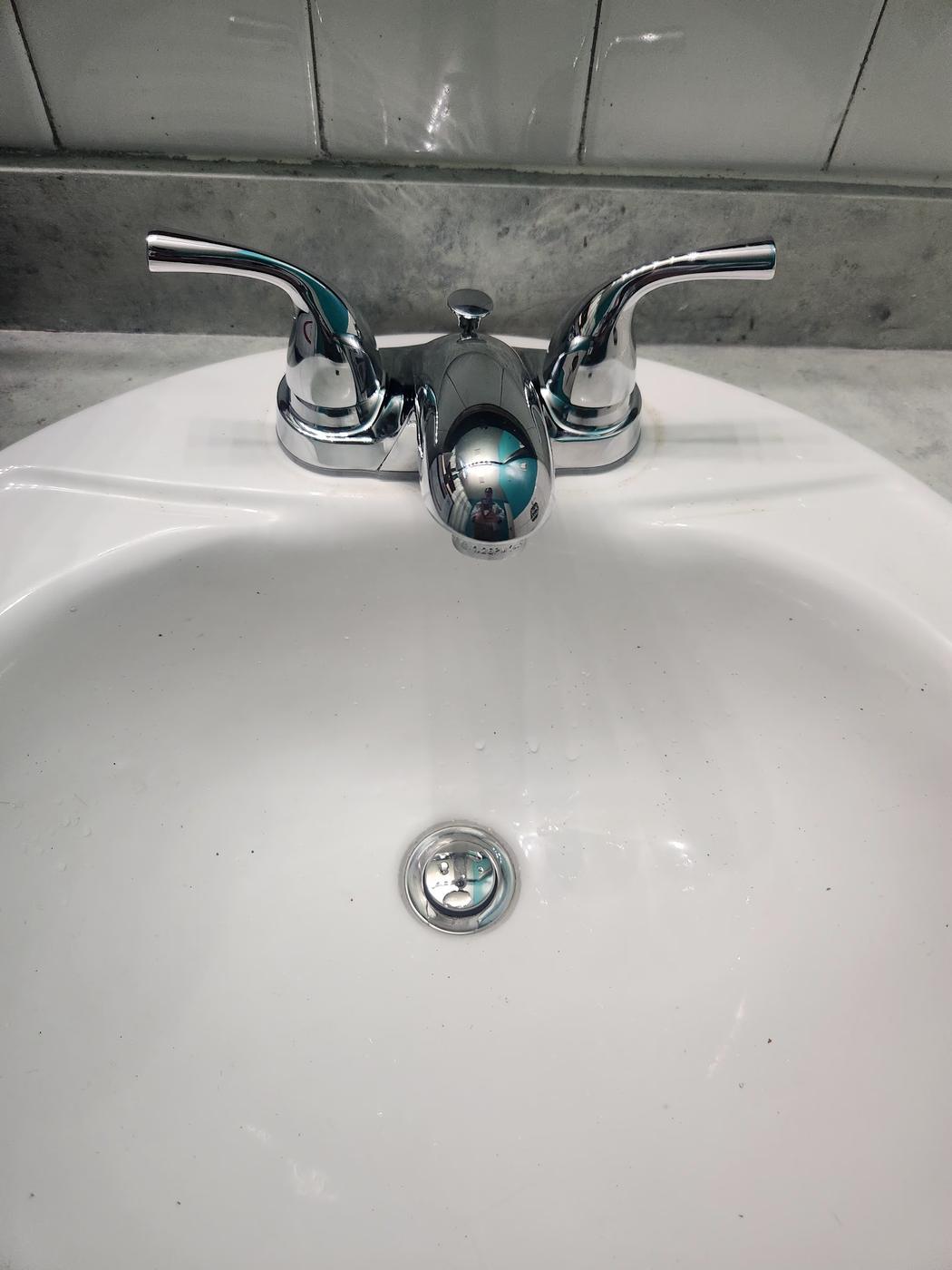 A basin faucet fitted, bathroom side.