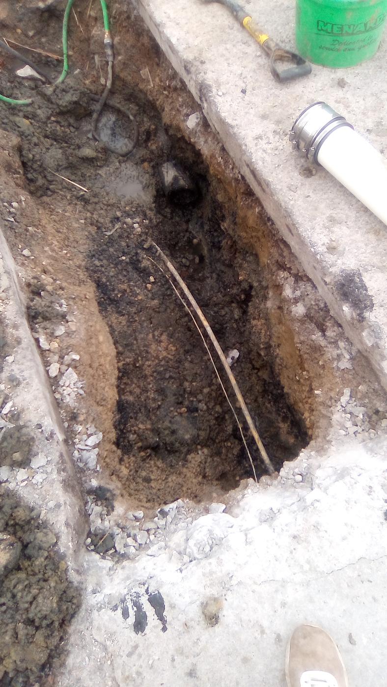 An excavated trench opened in the ground