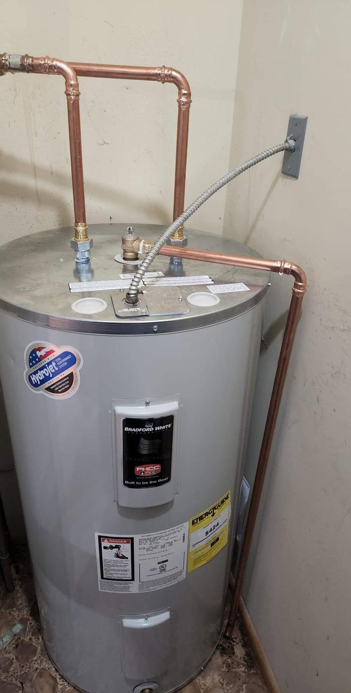 Another heater, re-piped and connected.